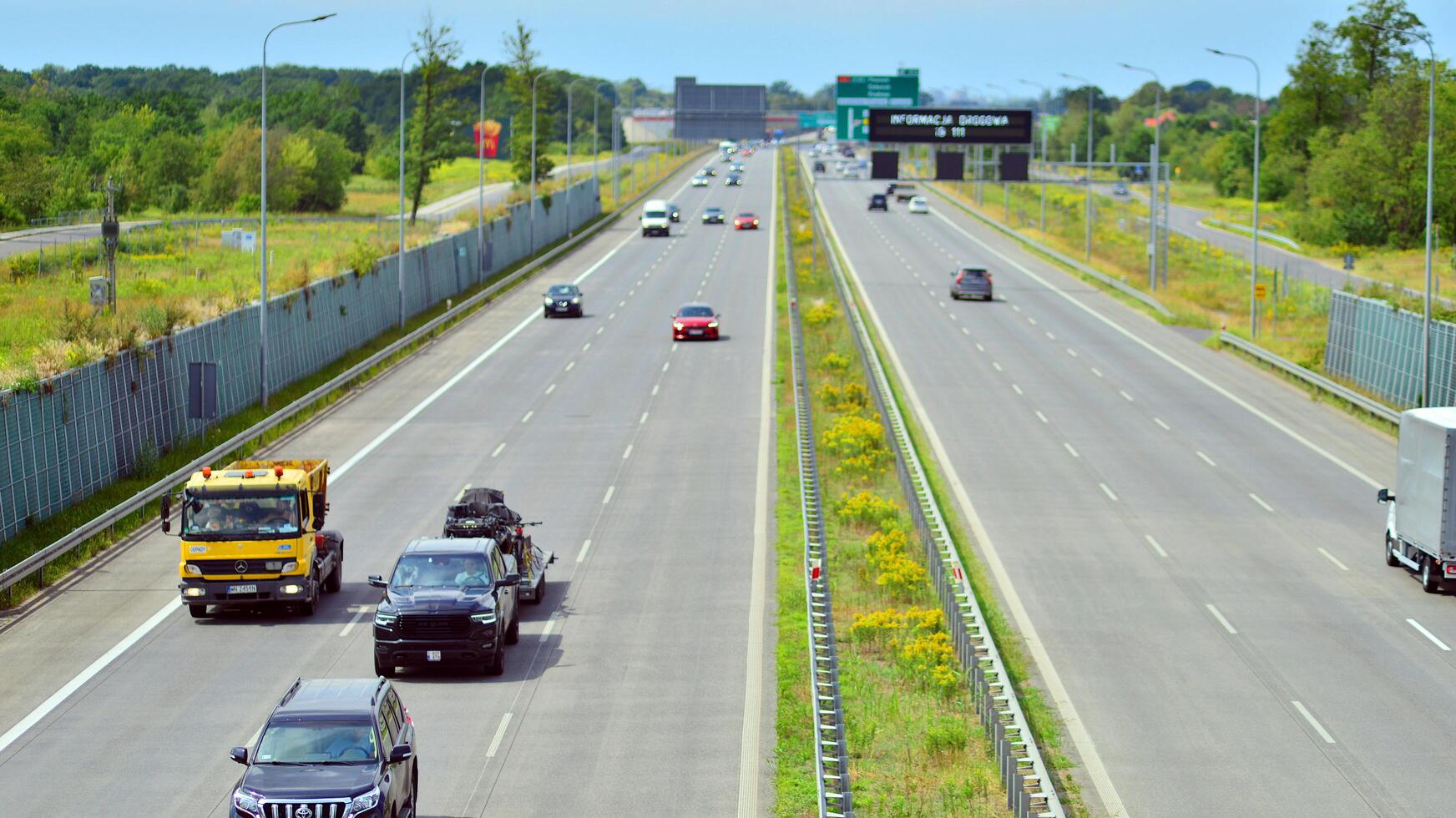 Warsaw, Poland. 24 July 2024. View of cars on the expressway S2, southern bypass of Warsaw in Wawer district. photo