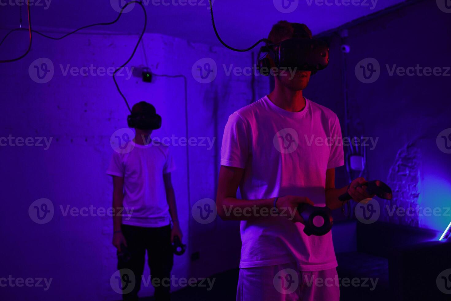 The player plays the game using virtual reality. Neon style. photo