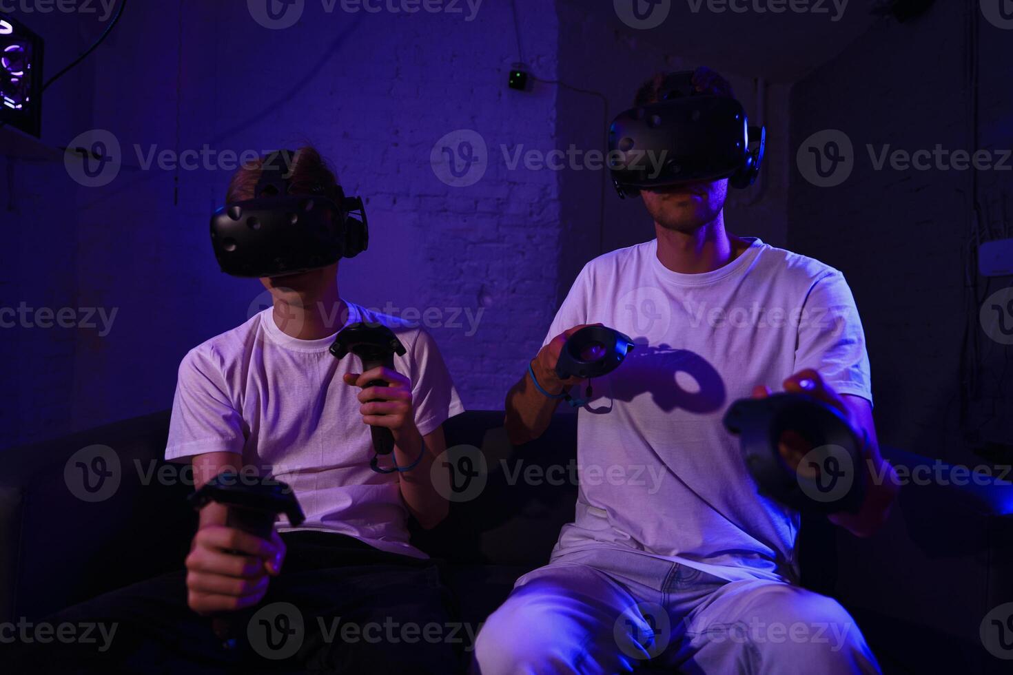 The player plays the game using virtual reality. Neon style. photo
