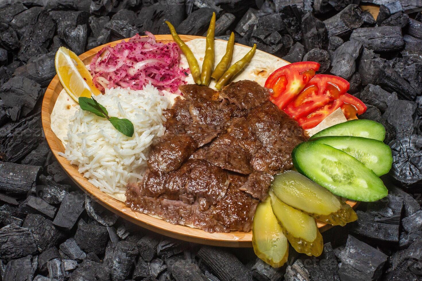 Grilled Meat Plate With Rice and Pickles photo