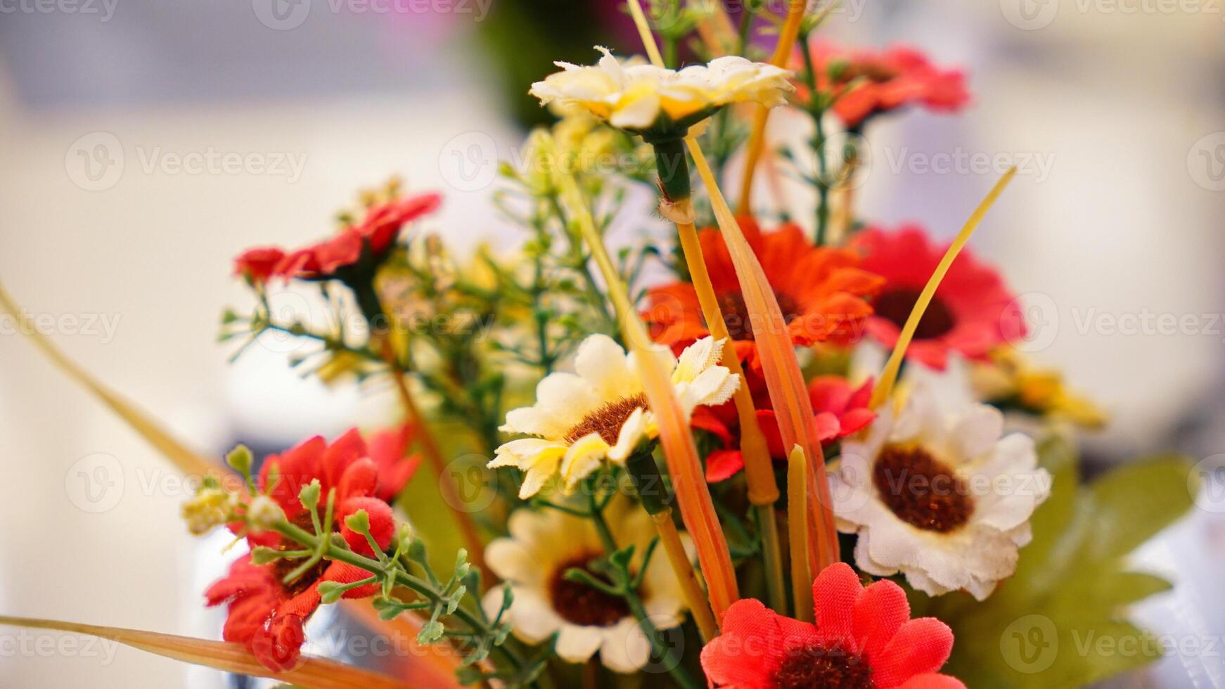 Colorful Flower Arrangement in a White Setting photo