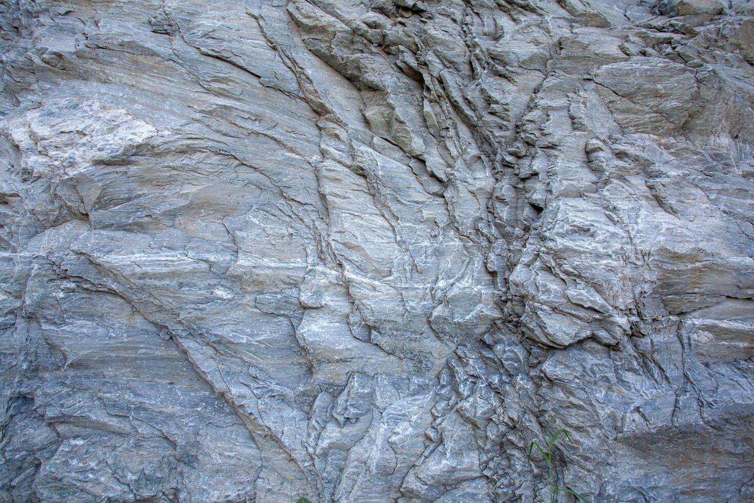 Close-up sharp cliff rock texture background image photo