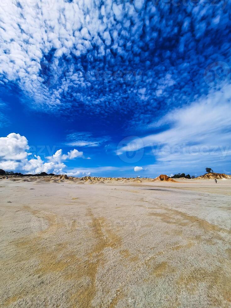 desert on Bintan Island during the day with sunny weather. with white and wet sand photo