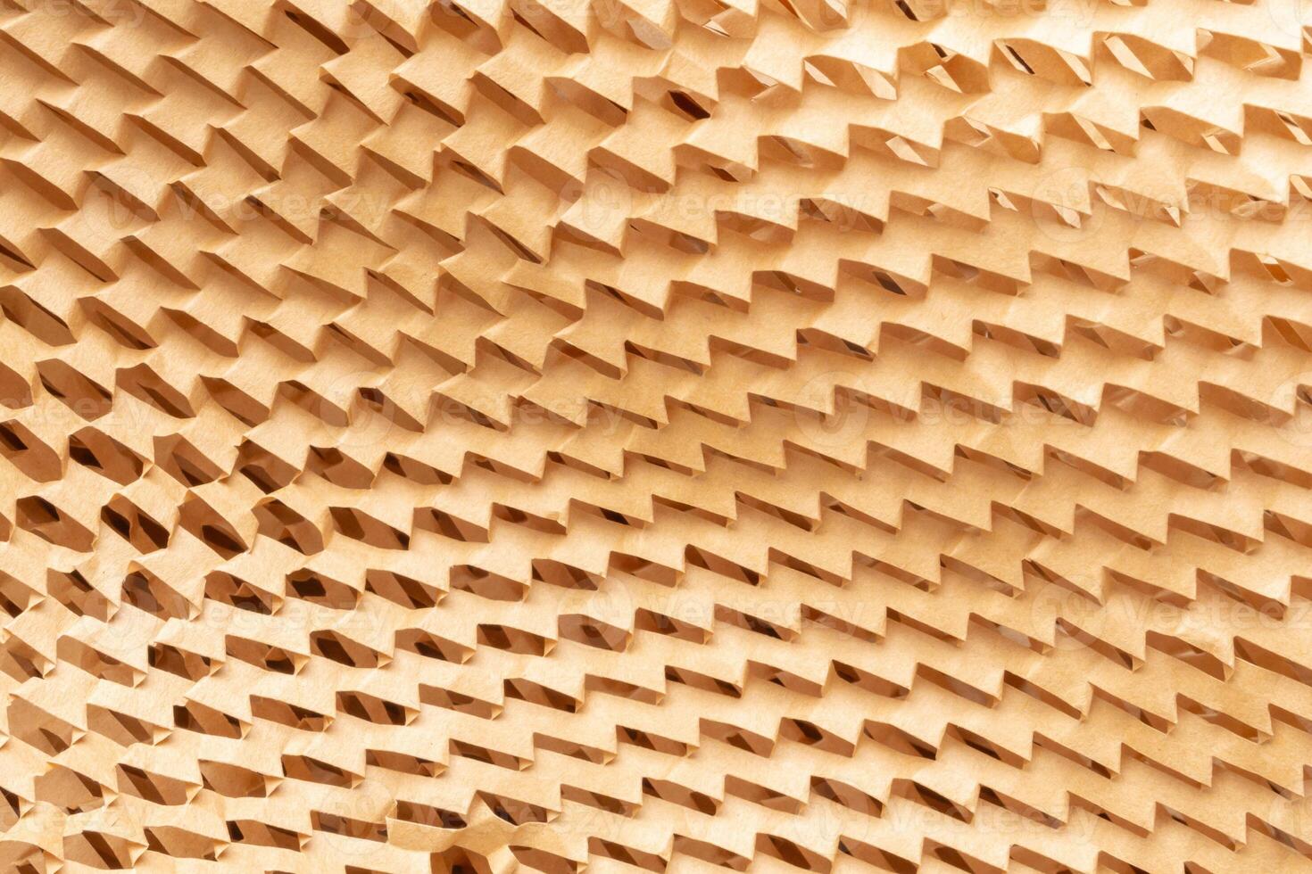 Eco friendly brown paper honeycomb texture wrap background for product packaging parcel carton box photo