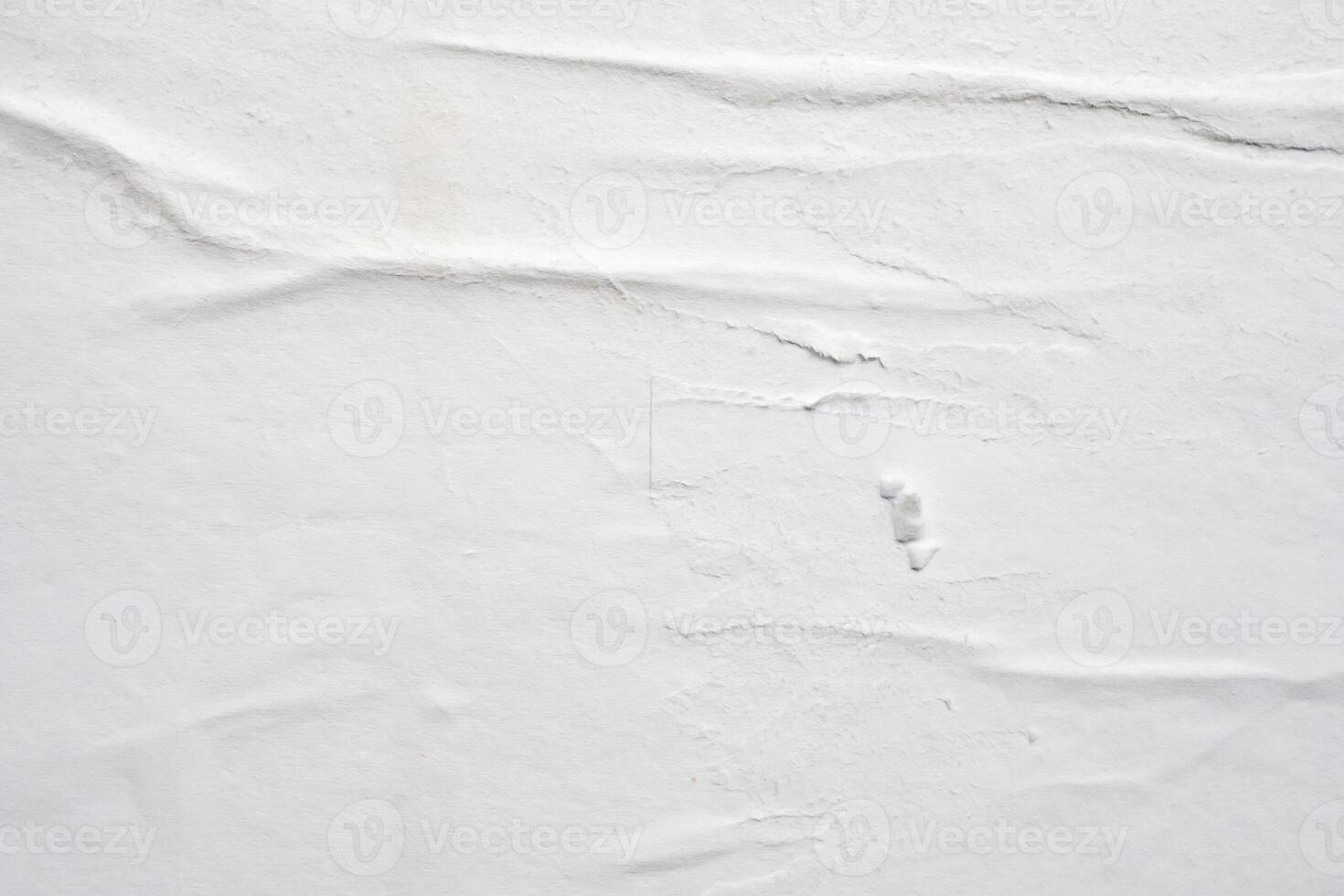 white crumpled and creased paper poster texture background photo
