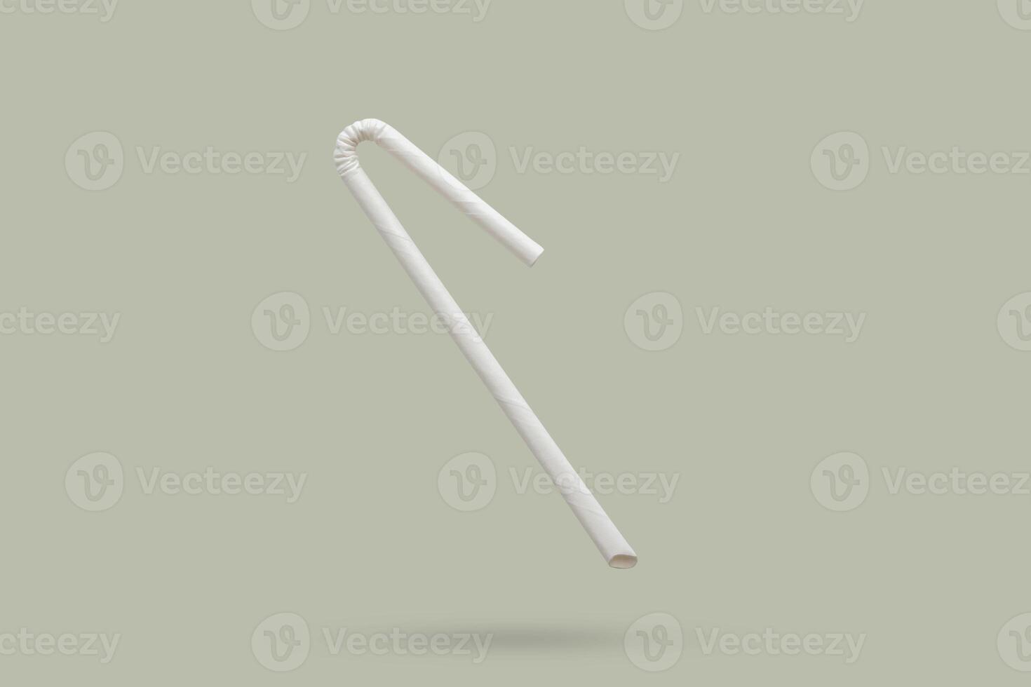 Biodegradable eco friendly white paper drinking straw mockup isolated on gray background photo