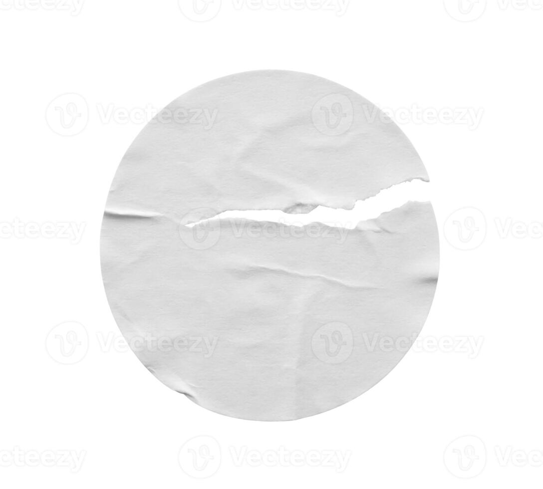 Blank white round torn paper sticker label isolated on white background photo