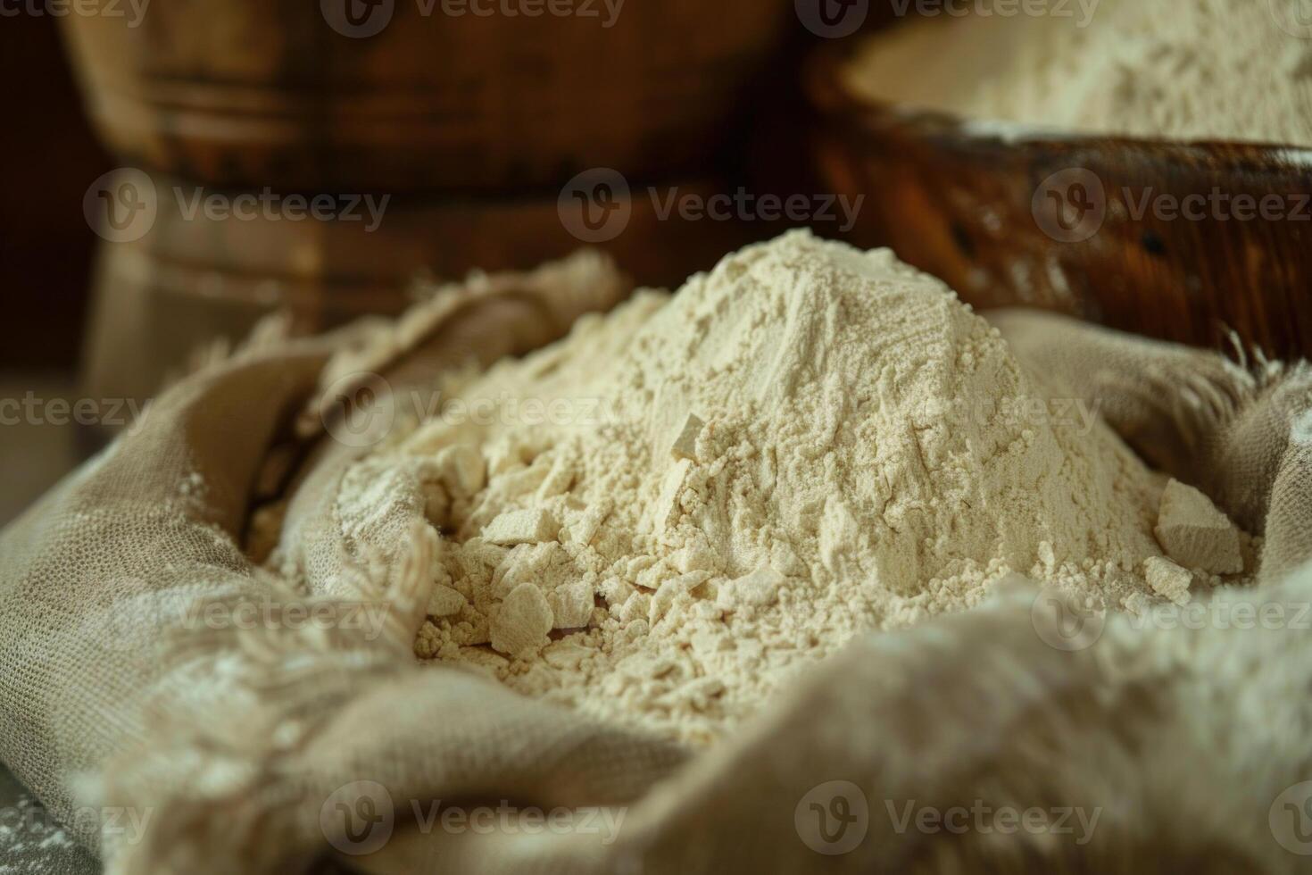 Flour spilling from burlap sack photo