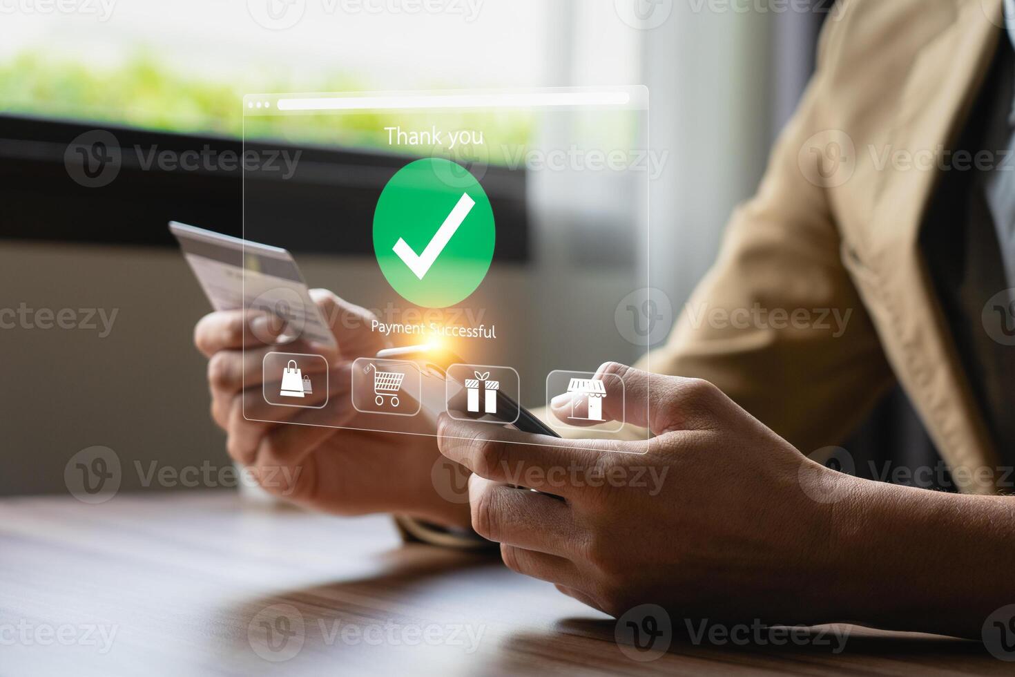 Person Making Online Payment with Credit Card on Laptop, Holographic Interface Showing Payment Successful and Shopping Icons, Representing E-commerce and Digital Transactions photo