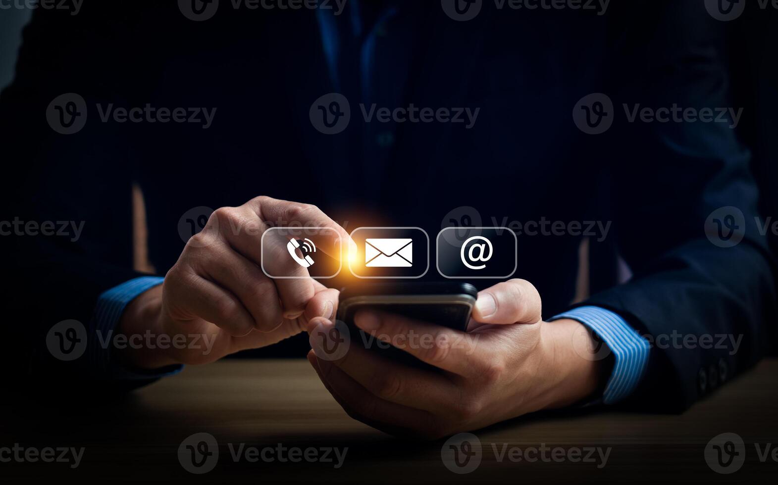 Man Using Smartphone to Access Communication Icons for Call, Email, and Internet, Representing Modern Digital Connectivity and Technology in Everyday Life photo