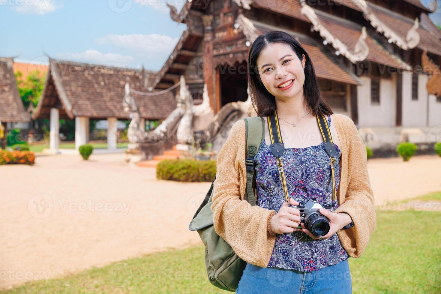Wat Ton Kwen, Beautiful Asian female Photographer Travel Temple in Chiangmai Province Northern of Thailand. photo
