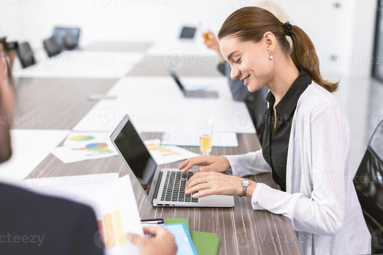 Business women talking with boss in office room, Marketing secretary work on the table with manager happy present information to deciding photo