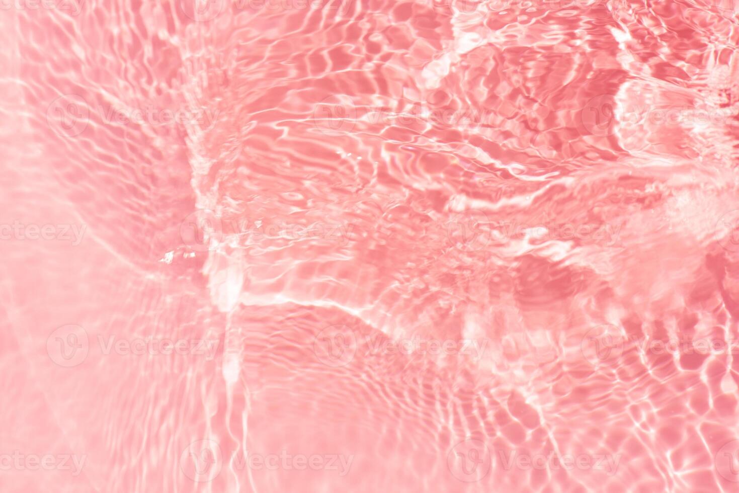 Bluewater waves on the surface ripples blurred. Defocus blurred transparent blue colored clear calm water surface texture with splash and bubbles. Water waves with shining pattern texture background. photo