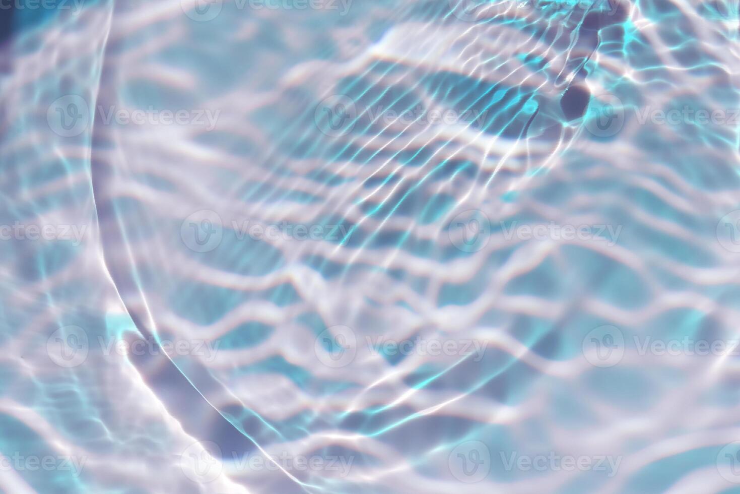 Blue water with ripples on the surface. Defocus blurred transparent blue colored clear calm water surface texture with splashes and bubbles. Water waves with shining pattern texture background. photo