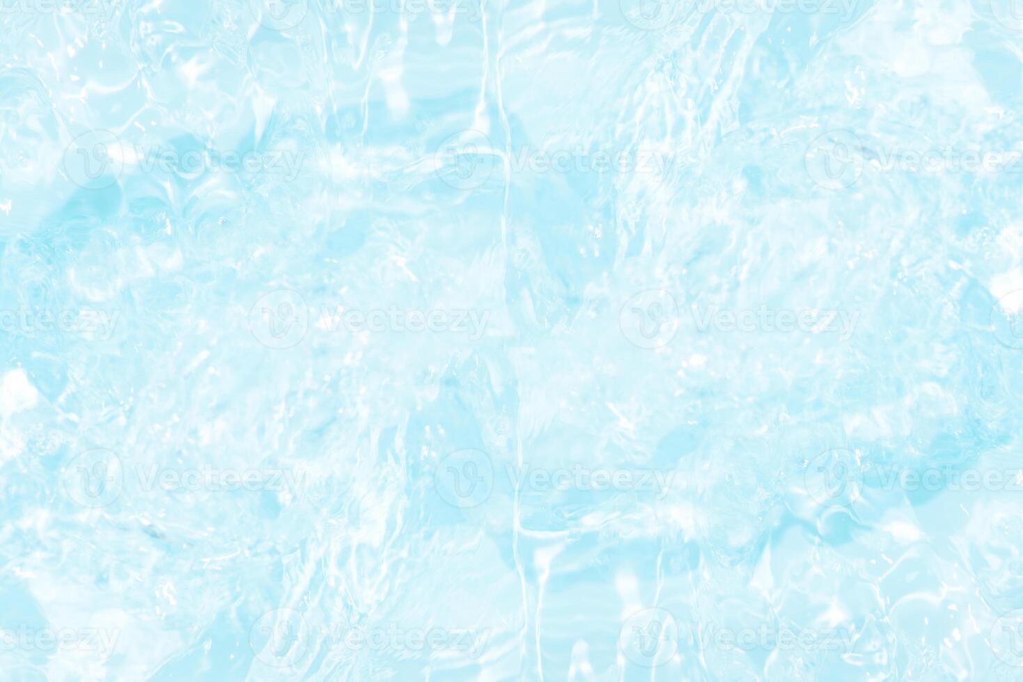 Blue water with ripples on the surface. Defocus blurred transparent blue colored clear calm water surface texture with splashes and bubbles. Water waves with shining pattern texture background. photo