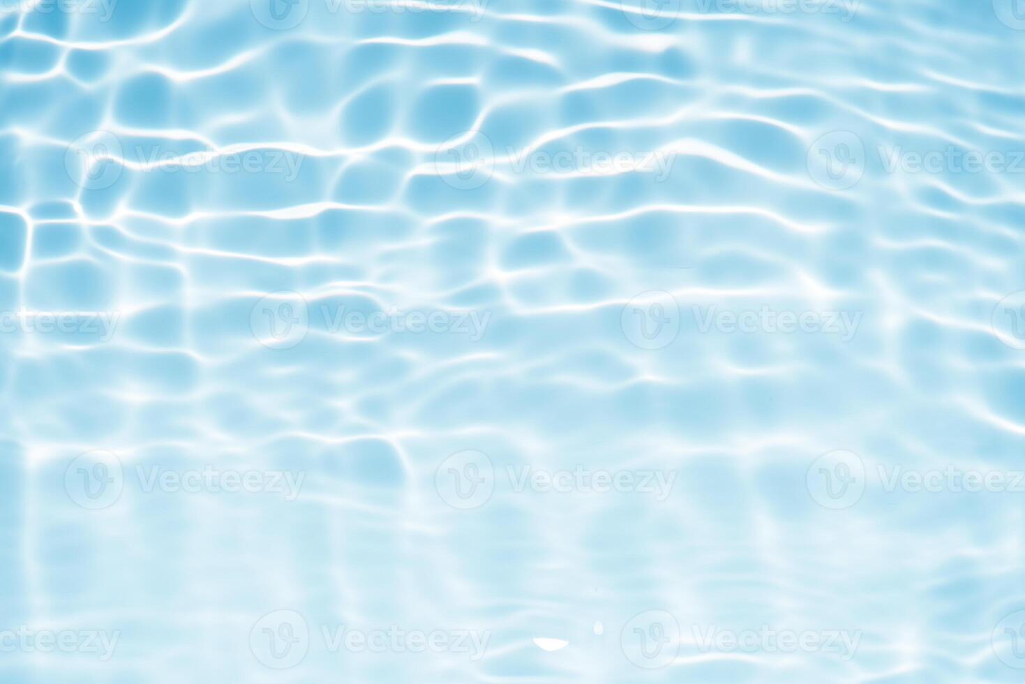 Bluewater waves on the surface ripples blurred. Defocus blurred transparent blue colored clear calm water surface texture with splash and bubbles. Water waves with shining pattern texture background. photo