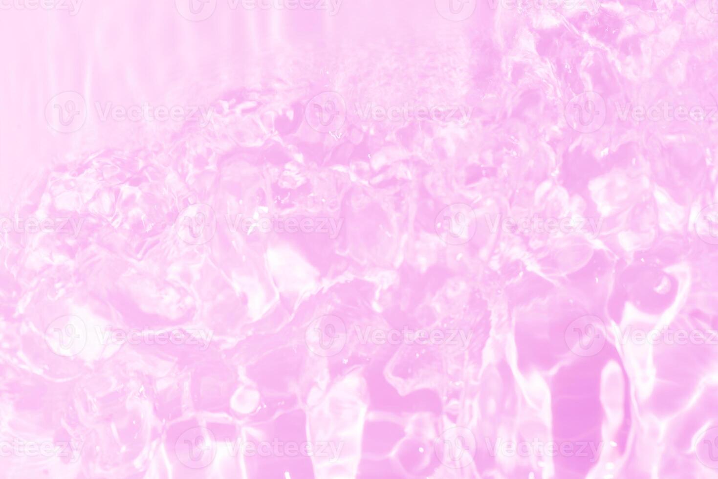 Blue water with ripples on the surface. Defocus blurred transparent blue colored clear calm water surface texture with splashes and bubbles. Water waves with shining pattern texture background. photo
