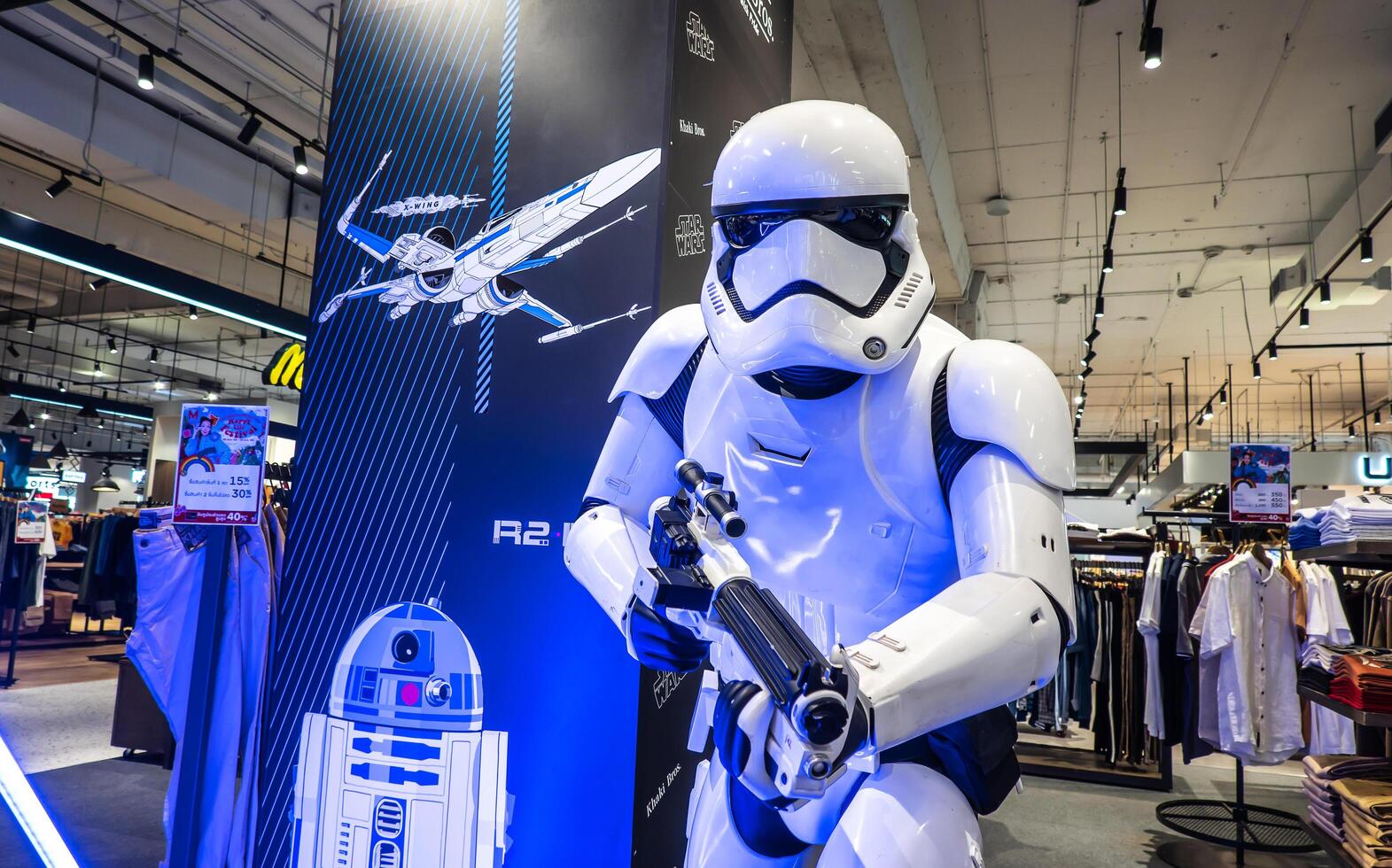 BANGKOK- Dec 16, 2021, Star War fashion of stormtrooper costume replica, with blaster E-11 gun. He is a fictional character of Star Wars saga. photo