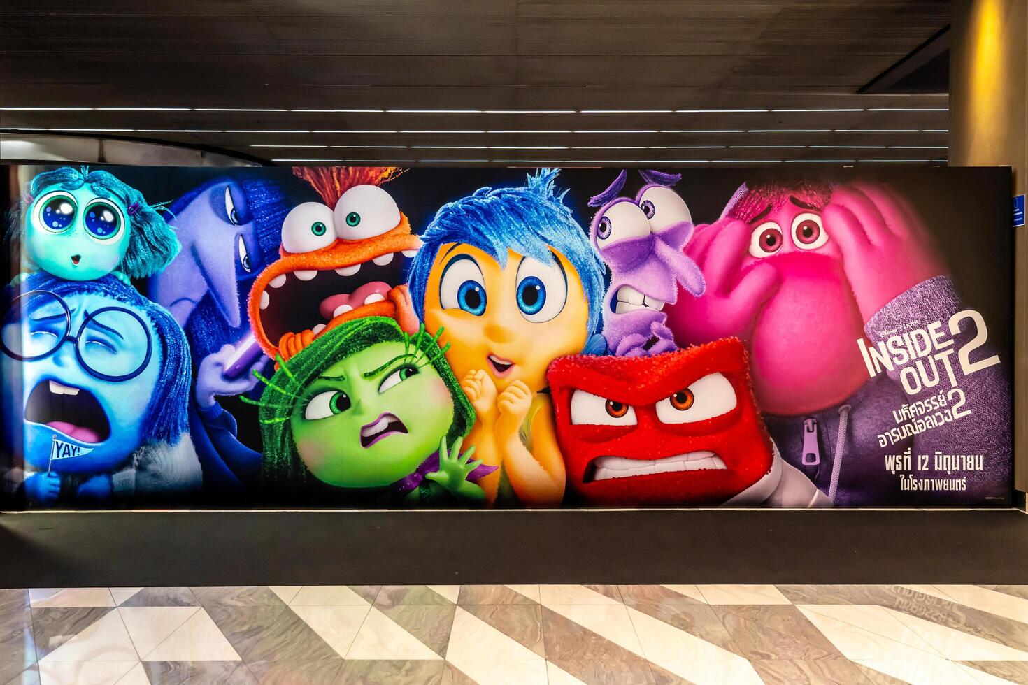 BANGKOK, THAILAND, 21 June 2024 - A beautiful standee of a movie called Inside out 2 from walt disney display at the cinema to promote the movie photo