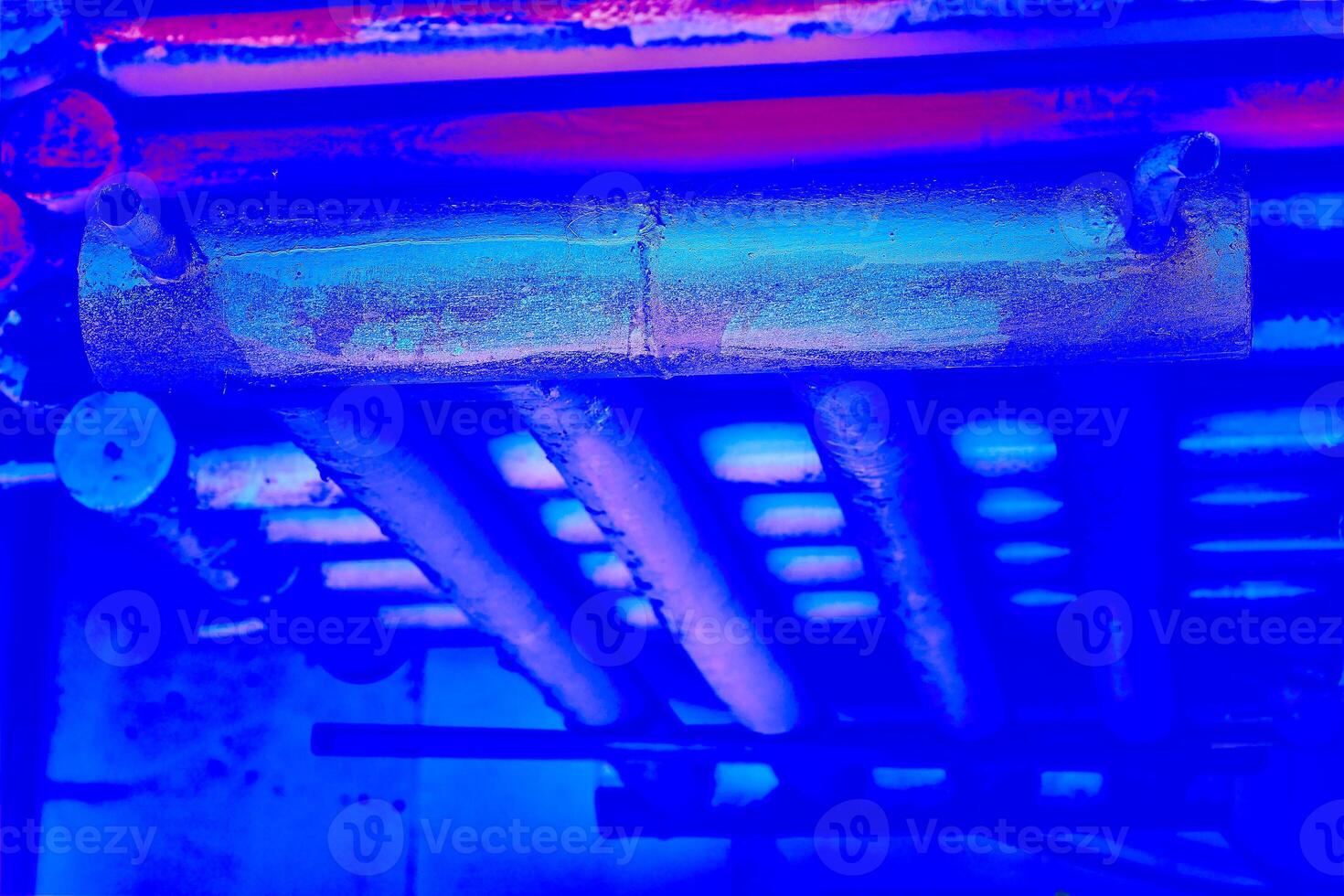 Vintage grunge metal blue heating battery old pipe section photo