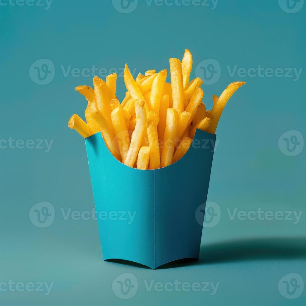 Golden French Fries in a Blue Box photo
