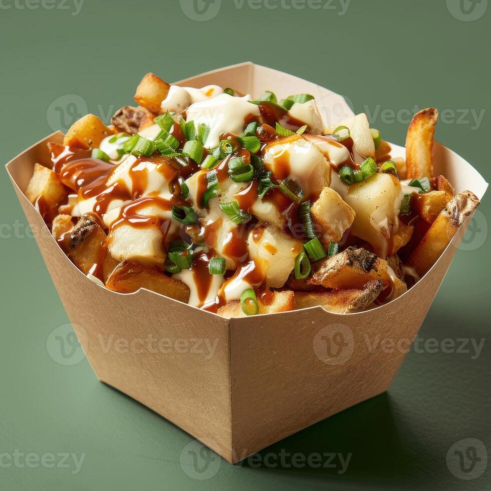 Poutine, Canadian dish with french fries, cheese curds, and gravy, topped with green onions. Fast food, street food, lunch, dinner, restaurant, takeout, delivery. photo