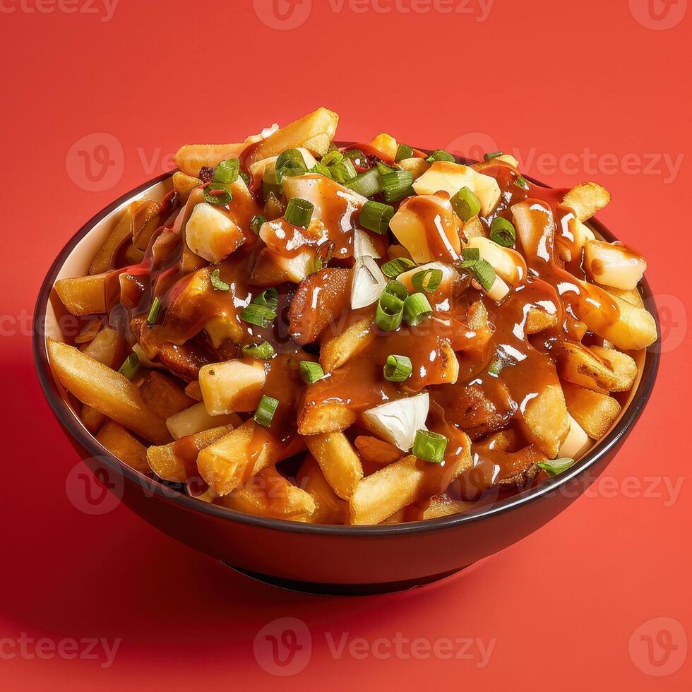 Close-up of a bowl of poutine, a Canadian dish of french fries topped with cheese curds and gravy. photo