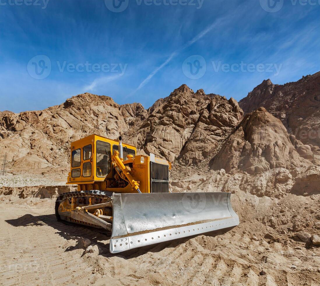 Road construction in Himalayas photo