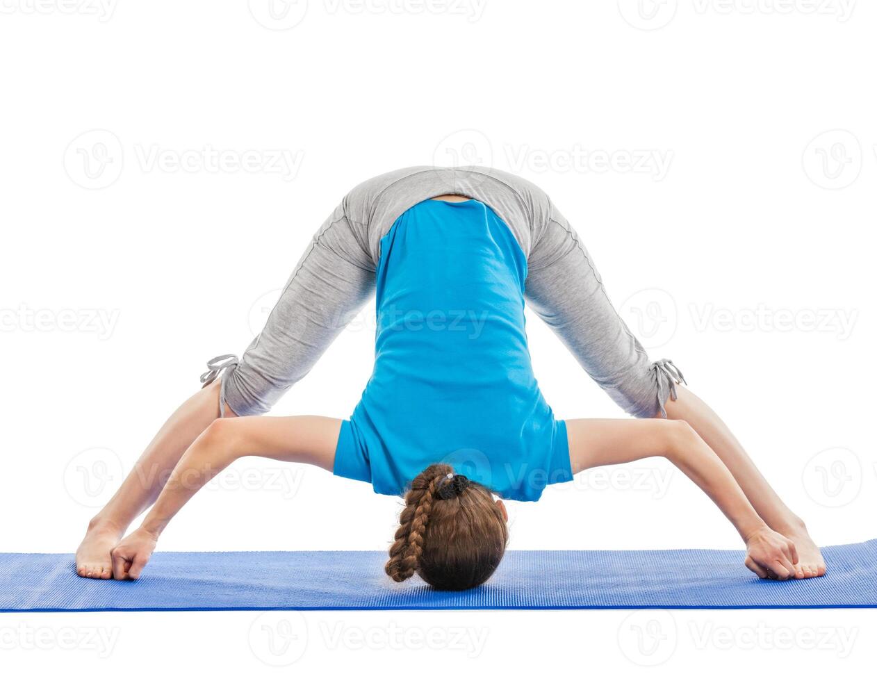 Yoga young beautiful woman doing yoga asana exercise isolated photo