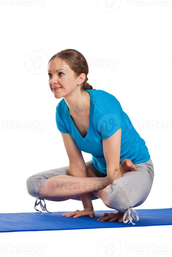 Yoga young beautiful woman doing yoga asana exercise isolated photo