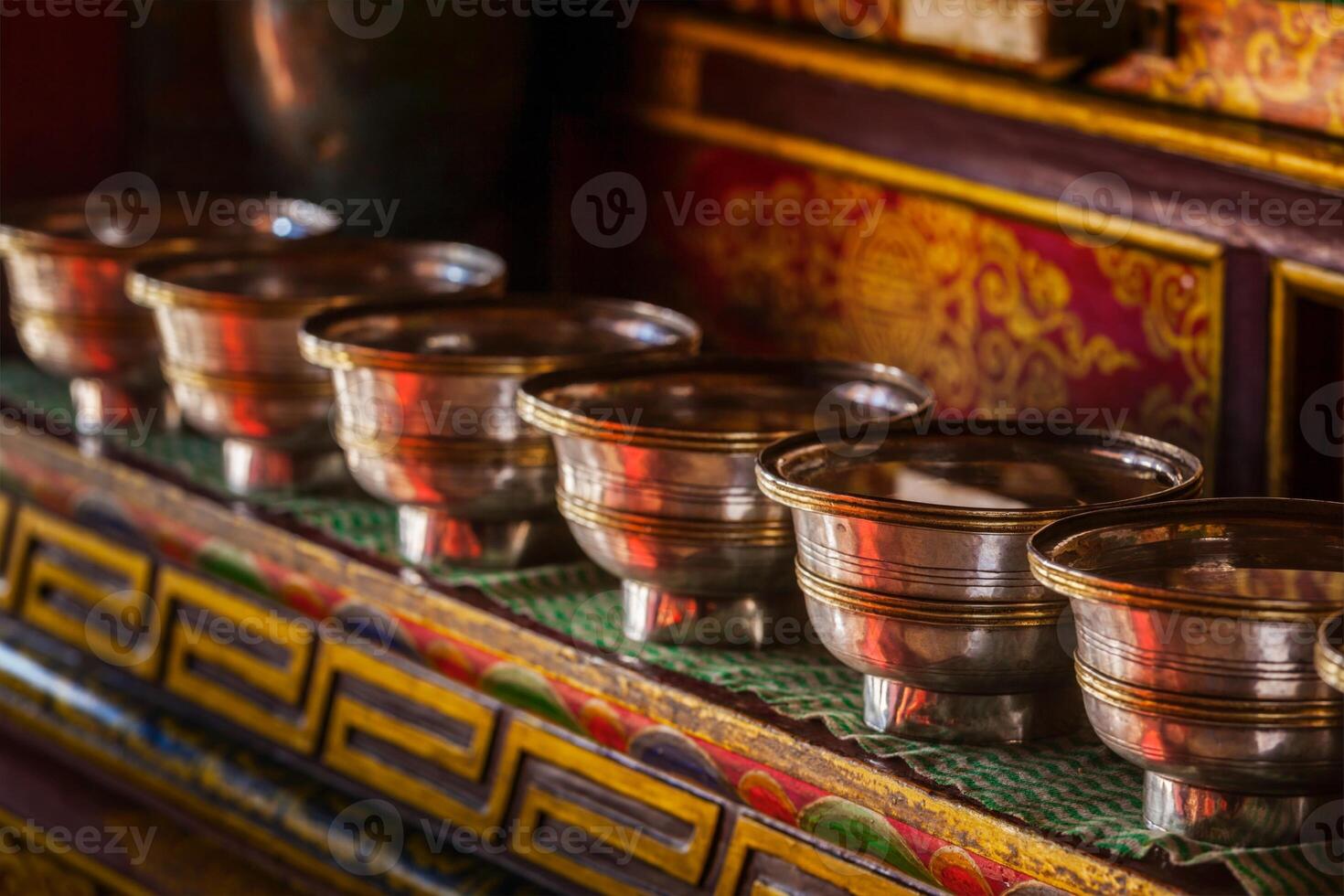 Offerings Tibetan Water Bowls in Lamayuru gompa photo