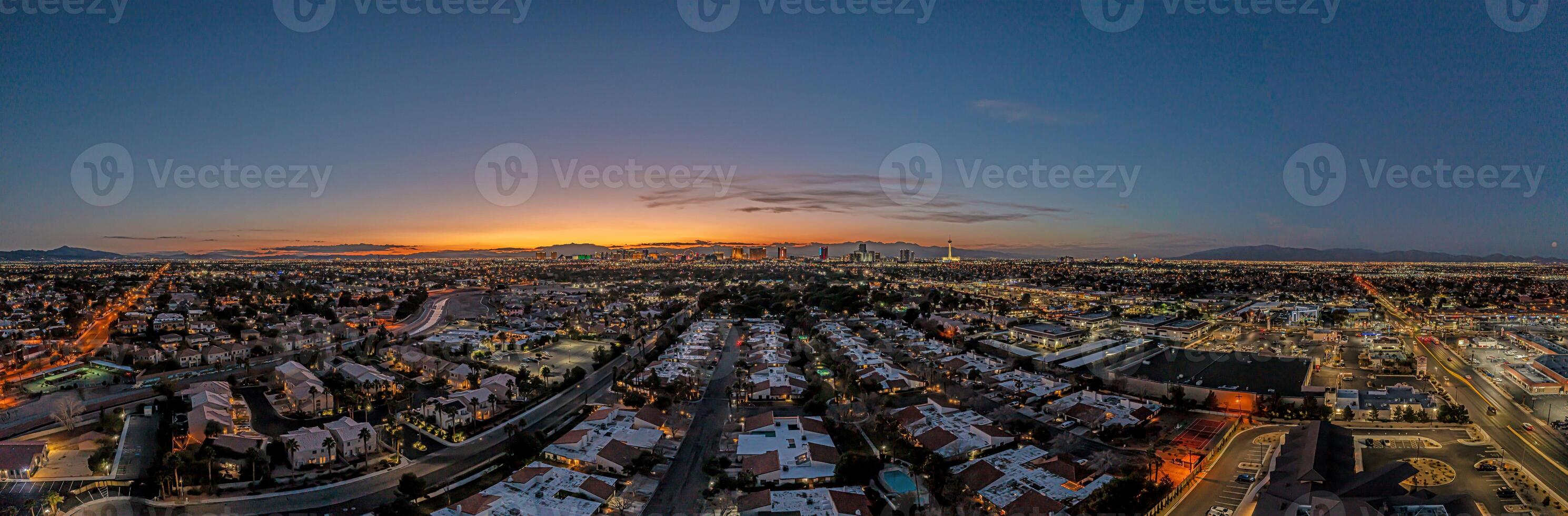 Aerial panoramic view of the illuminated skyline of Las Vegas at night photo