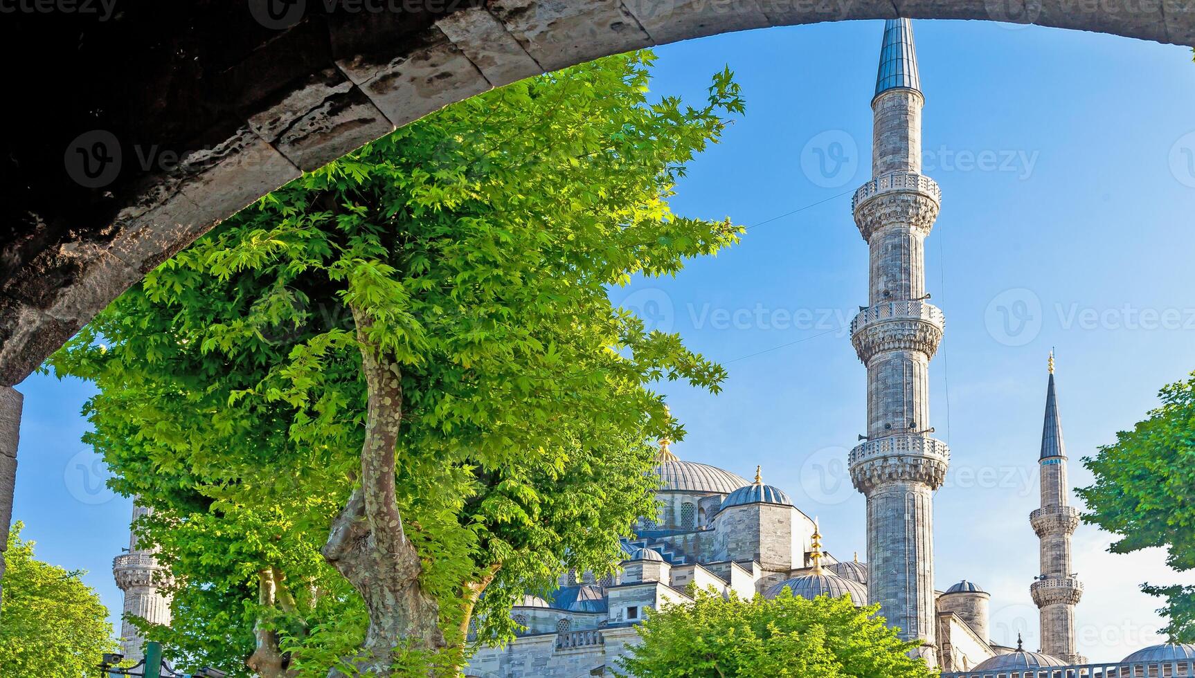 Picture of the Sultanahmed Mosque in Instanbul against a slightly cloudy sky photo