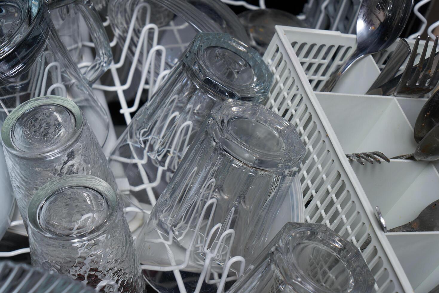 dishwasher with dirty dishes photo