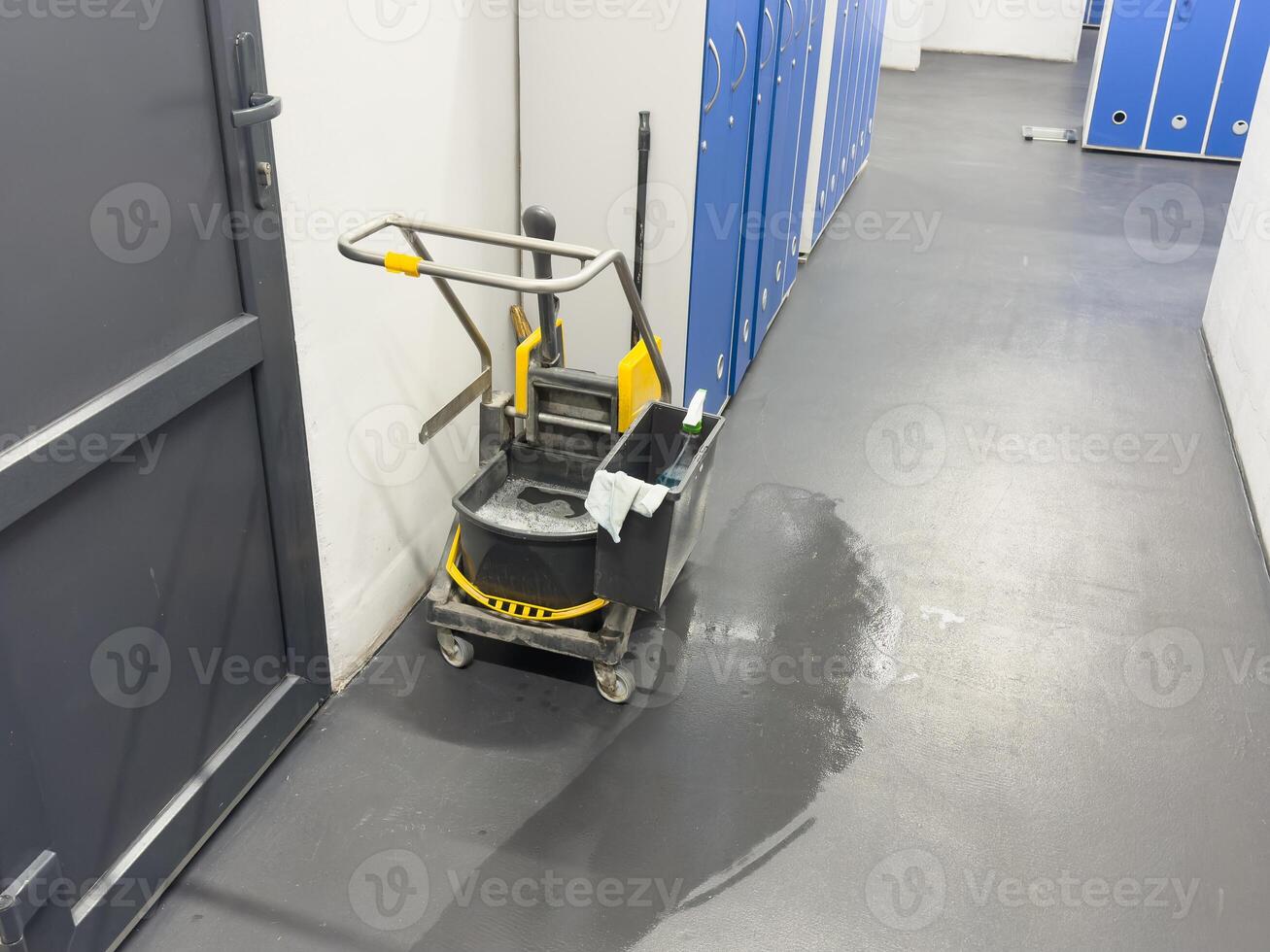 Closeup of cleaning equipments and tools for floor cleaning in the building at the airport. photo