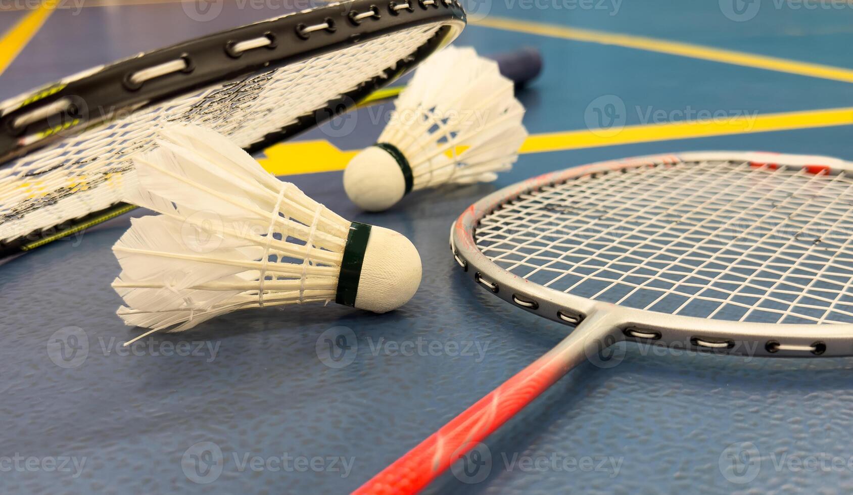 Racket and Shuttlecock with use sport or exercise on a black background. photo