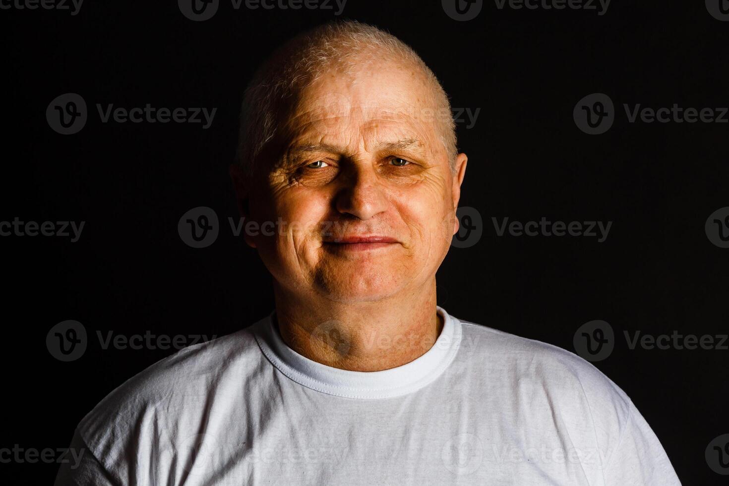 close-up portrait of happy senior man. photo