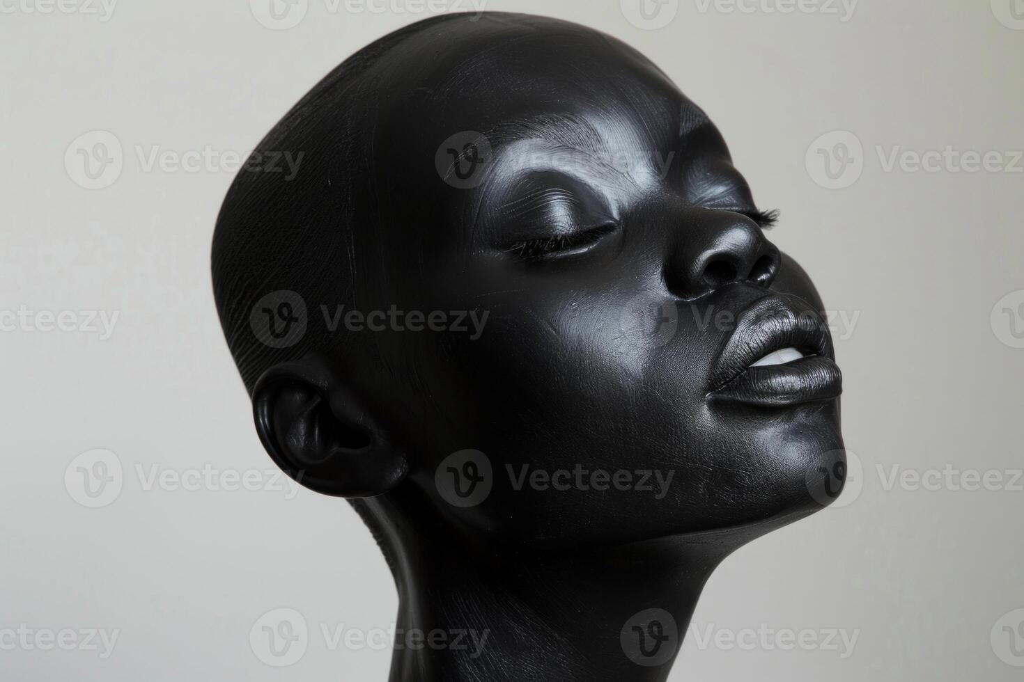 Black woman posing with metallic makeup for beauty photoshoot photo
