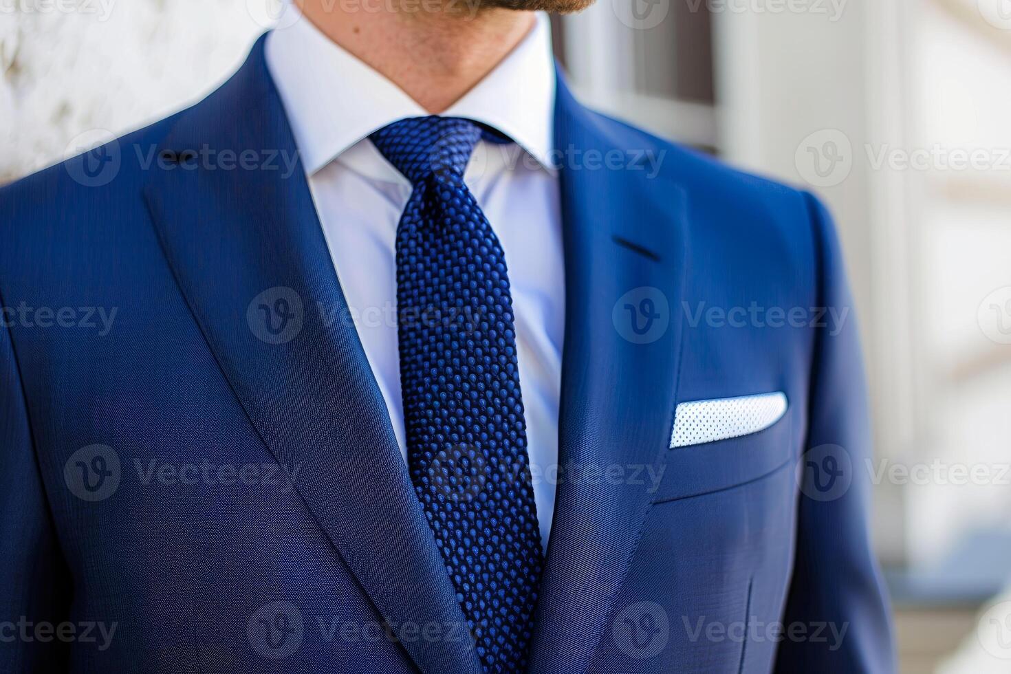 Elegant businessman in blue suit with tie photo