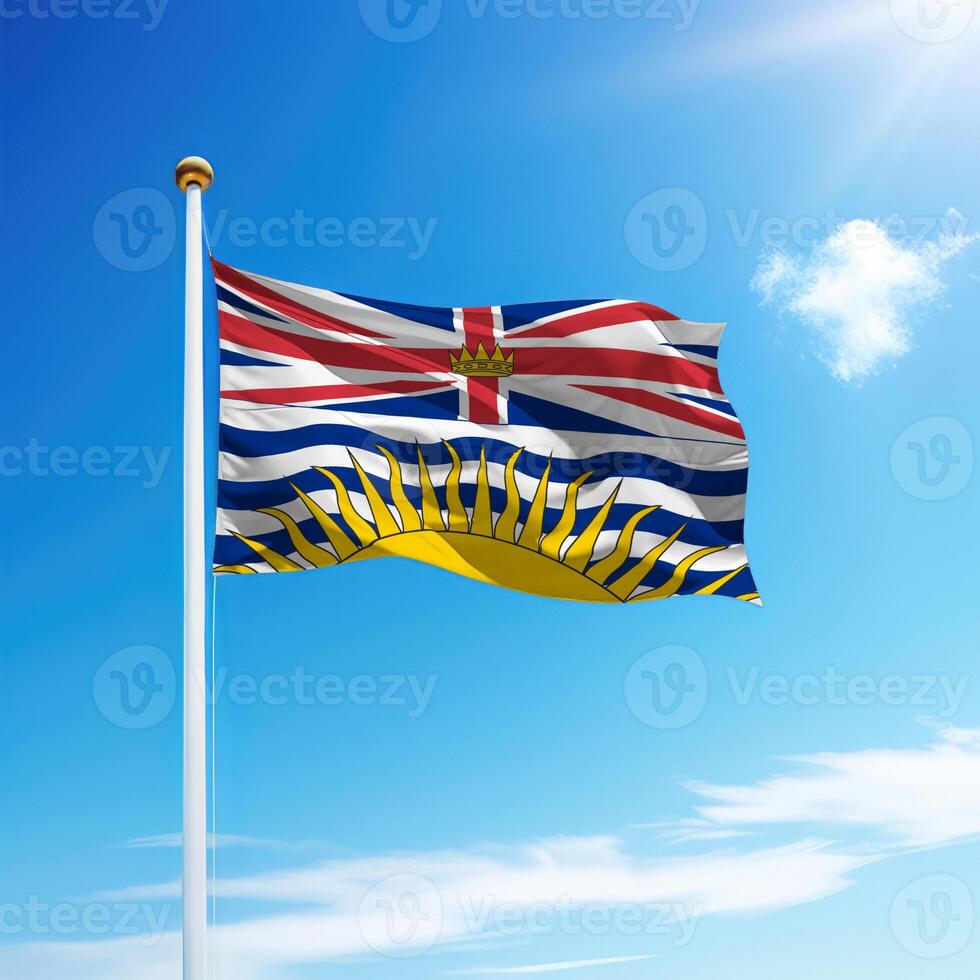Waving flag of British Columbia is a province of Canada on flagpole photo