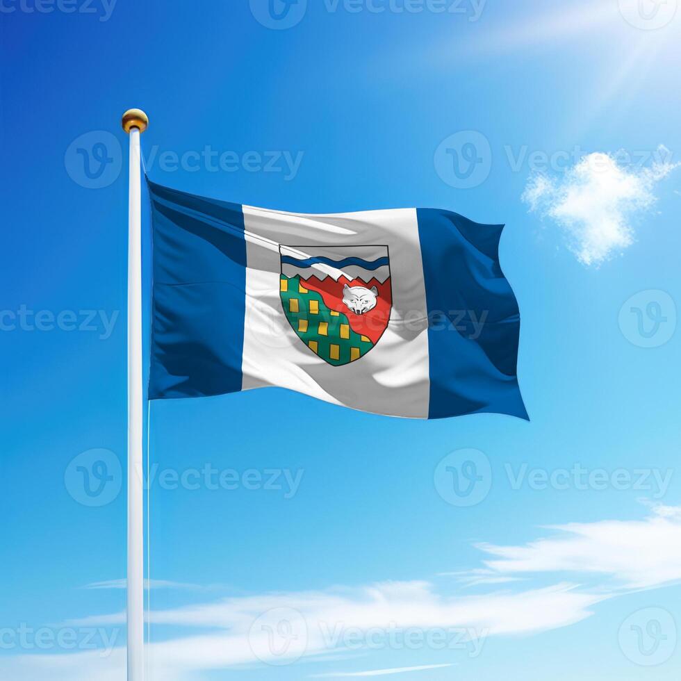Waving flag of Northwest Territories is a province of Canada on flagpole photo