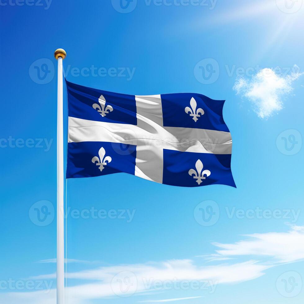Waving flag of Quebec is a province of Canada on flagpole photo