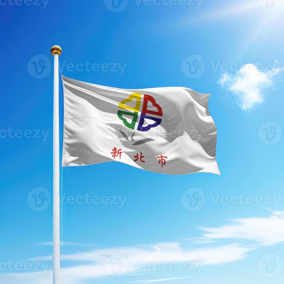Waving flag of New Taipei City is a region of Taiwan on flagpole photo