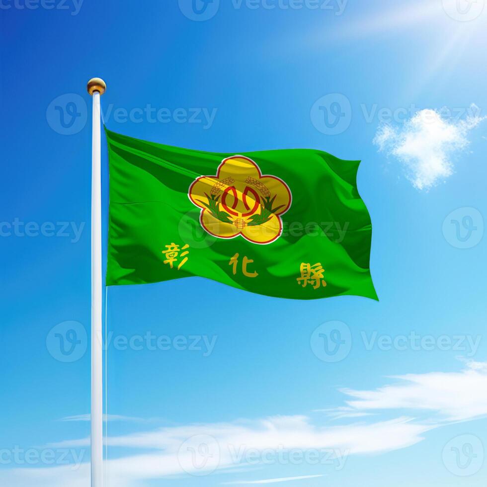 Waving flag of Changhua County is a region of Taiwan on flagpole photo