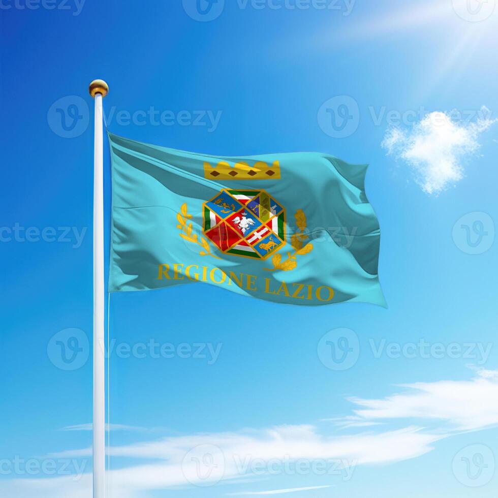 Waving flag of Lazio is a region of Italy on flagpole photo