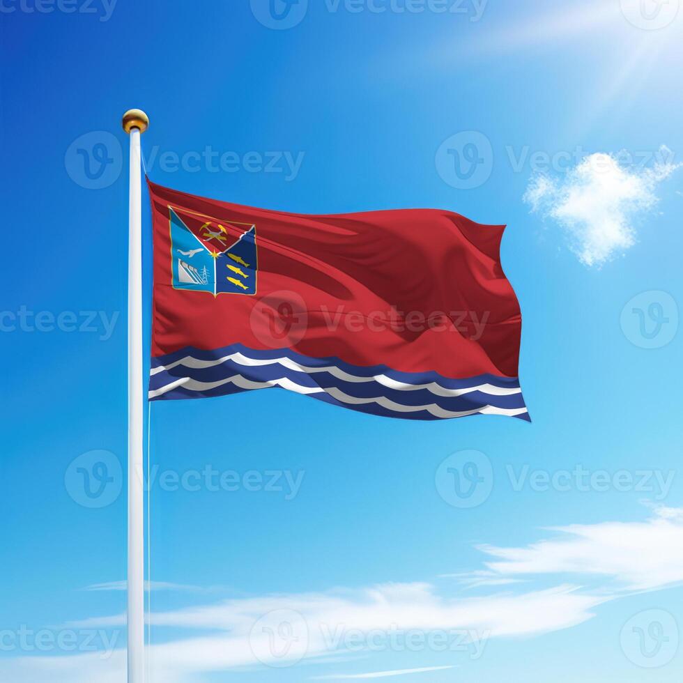 Waving flag of Magadan is a region of Russia on flagpole photo