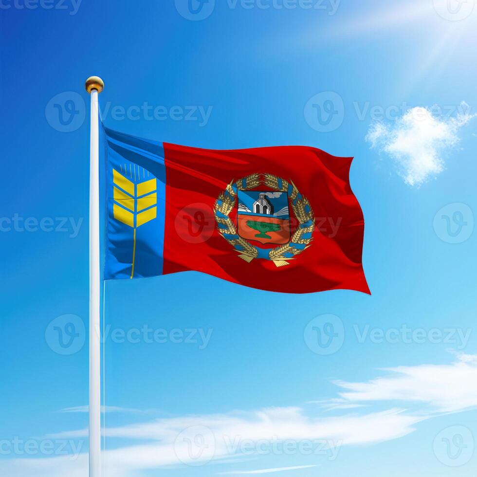 Waving flag of Altai Krai is a region of Russia on flagpole photo