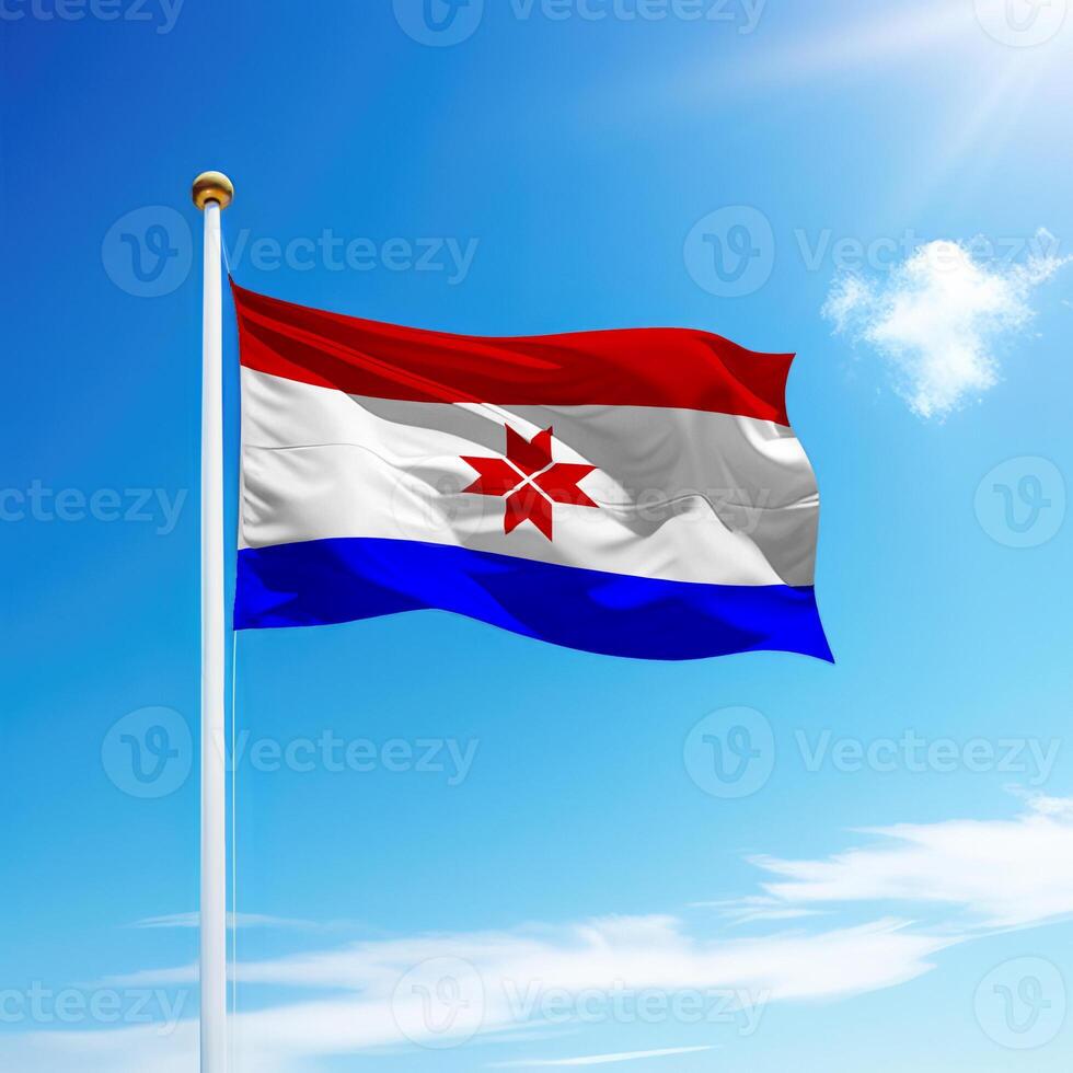 Waving flag of Mordovia is a region of Russia on flagpole photo