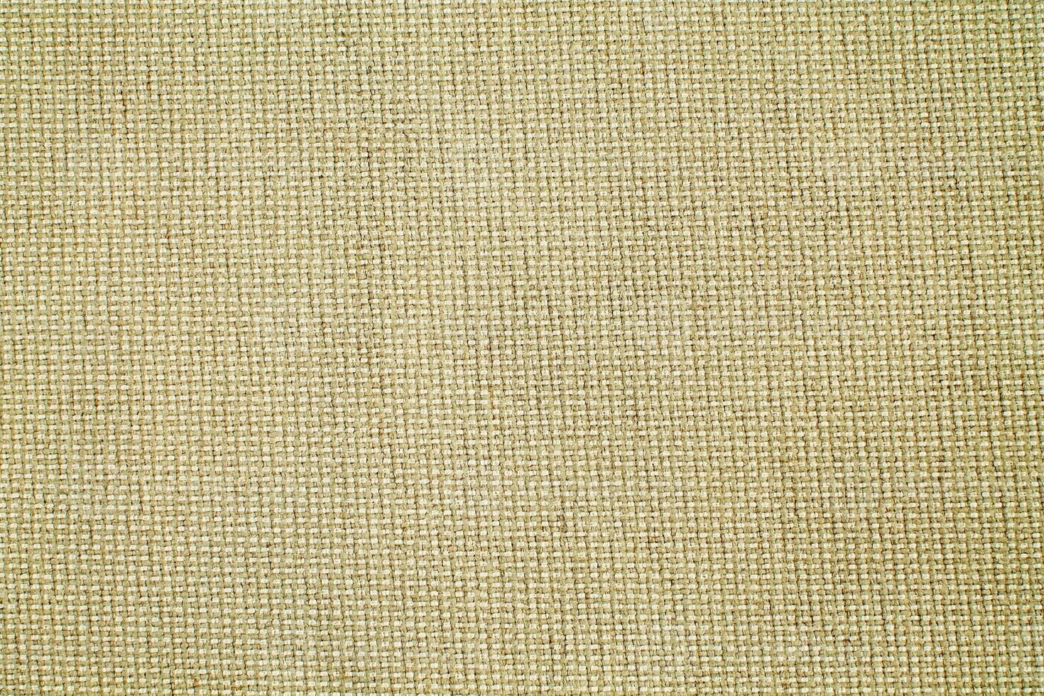 Natural linen material textile canvas Fabric texture background Close-up detail of fabric natural color Hemp material pattern design wallpaper. can be used as background or for graphic design photo