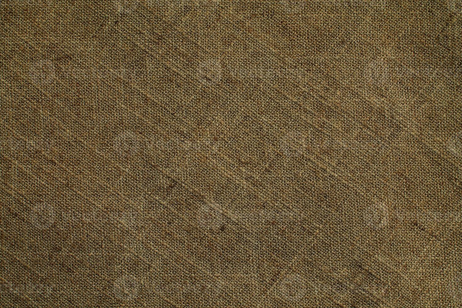 Natural linen material textile canvas Fabric texture background Close-up detail of fabric natural color Hemp material pattern design wallpaper. can be used as background or for graphic design photo